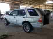 2000 Honda Passport LX with VIN 4S6CK58W6Y4409186, listed as a Copart auction lot 82193655 with 151,884 mi miles and Salvage title. Bid and sale history available at DreamBid. Image 2.