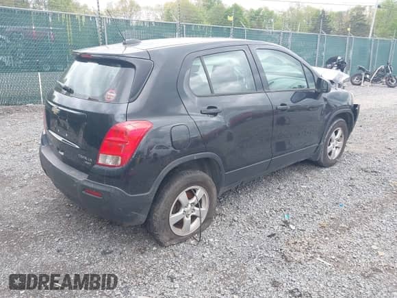 2016 Chevrolet Trax LS with VIN KL7CJNSB1GB612600, listed as a IAAI auction lot 41173692 with 123,296 mi miles and . Bid and sale history available at DreamBid. Image 4.