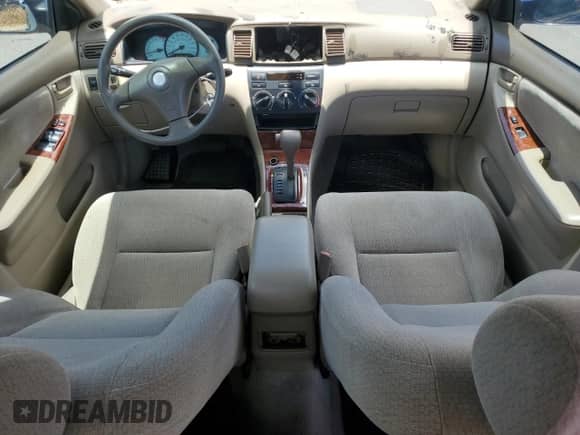 2004 Toyota Corolla CE z VIN 1NXBR32E04Z268677, wystawiony jako Copart lot #69282035 z przebiegiem 94 770 mil mil oraz Szkoda całkowita • Salvage title. Historia ofert i sprzedaży dostępna na DreamBid. Obrazek 8.