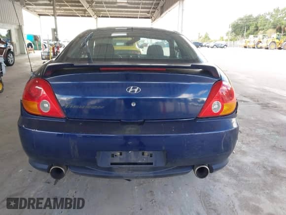 2003 Hyundai Tiburon с VIN KMHHM65D83U061336, выставлен на аукционе IAAI как лот 43151967 с пробегом 235 589 миль миль и . История ставок и продаж доступна на DreamBid. Изображение 16.
