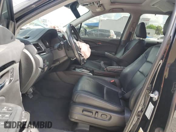 2022 Honda Pilot Touring 7-Passenger with VIN 5FNYF5H60NB034388, listed as a Copart auction lot 65687615 with 49,231 mi miles and Salvage title. Bid and sale history available at DreamBid. Image 7.