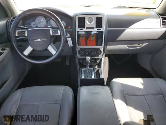 2007 Chrysler 300 Limited с VIN 2C3KA53G97H658292, выставлен на аукционе Copart как лот 50033315 с пробегом 176 230 миль миль и Списание • Salvage title. История ставок и продаж доступна на DreamBid. Изображение 8.