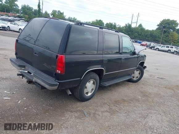 1999 Chevrolet Tahoe Z71 with VIN 1GNEK13RXXJ532089, listed as a IAAI auction lot 43019991 with 270,692 mi miles and . Bid and sale history available at DreamBid. Image 4.