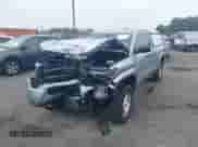 2024 Toyota Tacoma SR with VIN 3TYJDAHN7RT010103, listed as a IAAI auction lot 43009091 with 10,678 mi miles and . Bid and sale history available at DreamBid. Image 2.