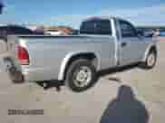 2004 Dodge Dakota z VIN 1D7FL16K44S506611, wystawiony jako Copart lot #82088555 z przebiegiem 264 052 mil mil oraz Szkoda całkowita • Salvage title. Historia ofert i sprzedaży dostępna na DreamBid. Obrazek 3.