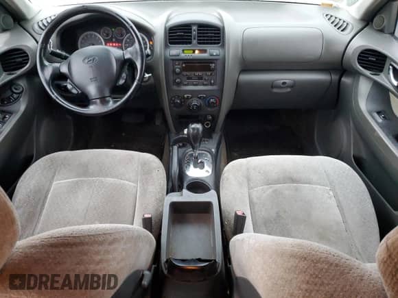 2005 Hyundai Santa Fe GLS z VIN KM8SC73D55U964970, wystawiony jako Copart lot #86136944 z przebiegiem 149 735 mil mil oraz Czysty tytuł • Clean title. Historia ofert i sprzedaży dostępna na DreamBid. Obrazek 8.