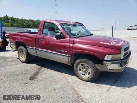 1995 Dodge 1500 with VIN 1B7HC16Y2SS282212, listed as a Copart auction lot 60216015 with 153,770 mi miles and Salvage title. Bid and sale history available at DreamBid. Image 4.