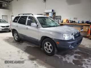 2001 Hyundai Santa Fe GLS с VIN KM8SC83D81U104738, выставлен на аукционе Copart как лот 85650284 с пробегом 215 619 миль миль и Списание • Salvage title. История ставок и продаж доступна на DreamBid. Изображение 4.