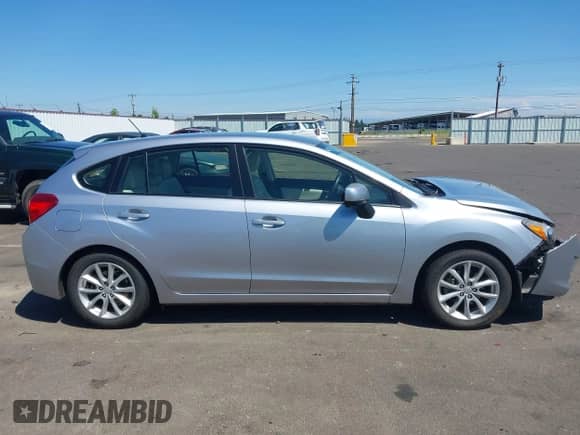 2014 Subaru Impreza Premium with VIN JF1GPAC63E8291981, listed as a IAAI auction lot 42842971 with 56,343 mi miles and . Bid and sale history available at DreamBid. Image 13.