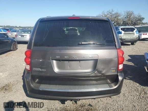 2018 Dodge Grand Caravan SXT z VIN 2C4RDGCGXJR309804, wystawiony jako Copart lot #86464065 z przebiegiem 180 884 mil mil oraz Czysty tytuł • Clean title. Historia ofert i sprzedaży dostępna na DreamBid. Obrazek 6.