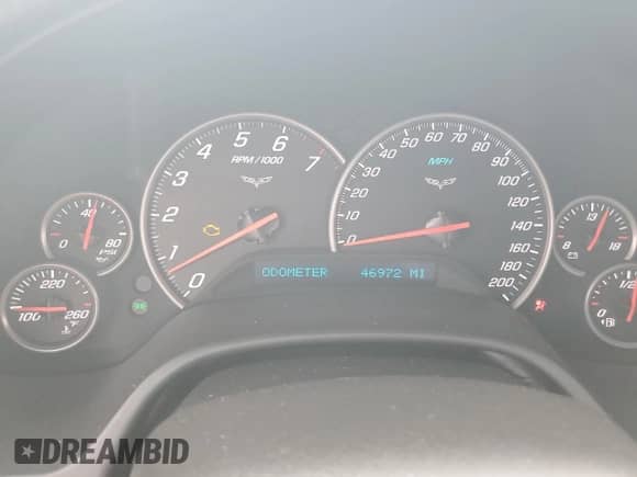 2012 Chevrolet Corvette 1LT z VIN 1G1YE2DW6C5110193, wystawiony jako Copart lot #71322425 z przebiegiem 46 972 mil mil oraz Szkoda całkowita • Salvage title. Historia ofert i sprzedaży dostępna na DreamBid. Obrazek 9.