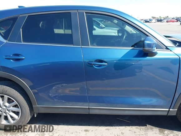 2023 Mazda CX-5 S Preferred z VIN JM3KFBCM8P0290216, wystawiony jako IAAI lot #43015320 z przebiegiem 22 704 mil mil oraz . Historia ofert i sprzedaży dostępna na DreamBid. Obrazek 13.