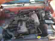 1996 Toyota Tacoma z VIN 4TAPM62N7TZ136944, wystawiony jako Copart lot #82388415 z przebiegiem 203 425 mil mil oraz Szkoda całkowita • Salvage title. Historia ofert i sprzedaży dostępna na DreamBid. Obrazek 11.