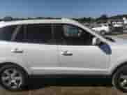 2007 Hyundai Santa Fe SE z VIN 5NMSH73E37H066098, wystawiony jako IAAI lot #43111802 z przebiegiem 167 222 mil mil oraz . Historia ofert i sprzedaży dostępna na DreamBid. Obrazek 13.