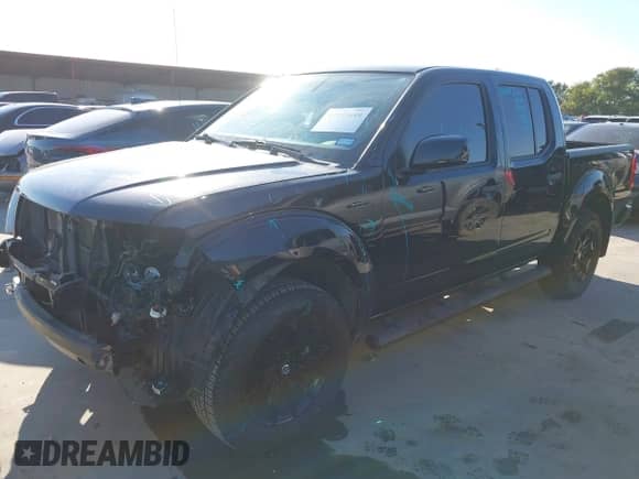 2020 Nissan Frontier SV with VIN 1N6ED0EA9LN713138, listed as a IAAI auction lot 43136449 with 65,136 mi miles and . Bid and sale history available at DreamBid. Image 2.