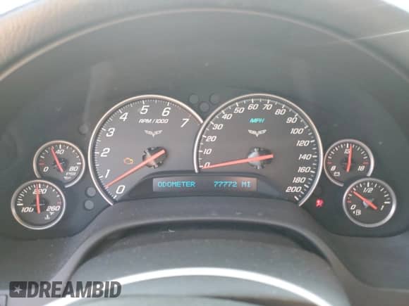 2006 Chevrolet Corvette с VIN 1G1YY36U865125842, выставлен на аукционе Copart как лот 71679785 с пробегом 77 772 миль миль и Чистый • Clean title. История ставок и продаж доступна на DreamBid. Изображение 9.