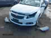 2014 Chevrolet Cruze 1LT z VIN 1G1PC5SB8E7297057, wystawiony jako IAAI lot #43383534 z przebiegiem 196 127 mil mil oraz . Historia ofert i sprzedaży dostępna na DreamBid. Obrazek 6.