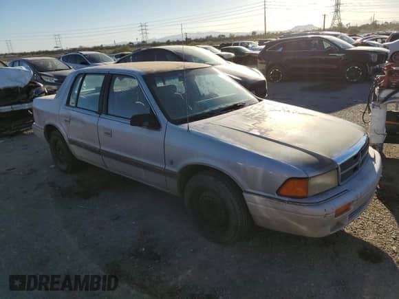 1991 Dodge Spirit with VIN 1B3XA5639MF549470, listed as a Copart auction lot 76051284 with 62,309 mi miles and Salvage title. Bid and sale history available at DreamBid. Image 4.