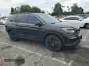 2022 Honda Pilot Special Edition with VIN 5FNYF5H21NB023767, listed as a Copart auction lot 65814435 with 63,461 mi miles and Salvage title. Bid and sale history available at DreamBid. Image 4.