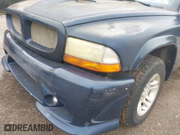 2003 Dodge Dakota with VIN 1D7FL16X83S140498, listed as a IAAI auction lot 43294302 with 106,313 mi miles and . Bid and sale history available at DreamBid. Image 6.