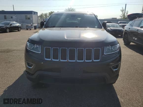 2016 Jeep Grand Cherokee Laredo with VIN 1C4RJFAG2GC379787, listed as a Copart auction lot 84704385 with 112,063 mi miles and Salvage title. Bid and sale history available at DreamBid. Image 5.