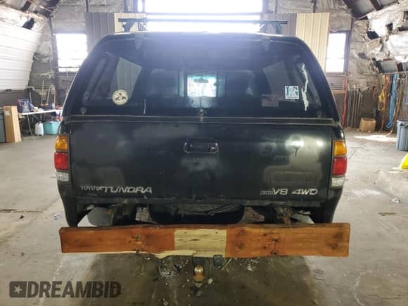 2001 Toyota Tundra Limited z VIN 5TBBT48141S154805, wystawiony jako Copart lot #66225125 z przebiegiem 216 119 mil mil oraz Czysty tytuł • Clean title. Historia ofert i sprzedaży dostępna na DreamBid. Obrazek 6.