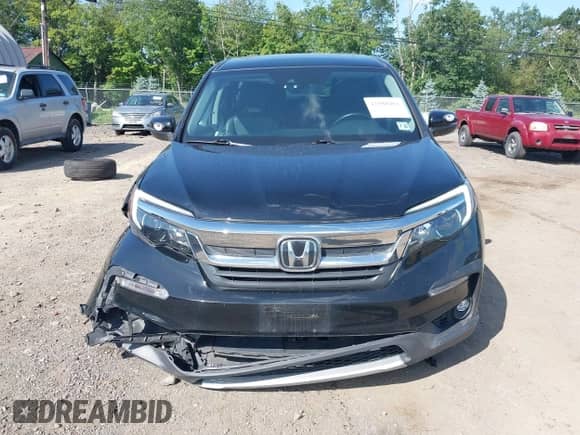 2020 Honda Pilot EX-L z VIN 5FNYF6H57LB033099, wystawiony jako IAAI lot #42588491 z przebiegiem 135 945 mil mil oraz . Historia ofert i sprzedaży dostępna na DreamBid. Obrazek 6.