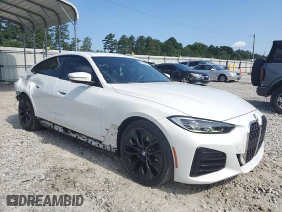 2023 BMW 4 Series 430i с VIN WBA63AV09PFN56781, выставлен на аукционе Copart как лот 64009475 с пробегом 42 844 миль миль и Списание • Salvage title. История ставок и продаж доступна на DreamBid. Изображение 4.