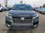 2020 Honda Passport EX-L with VIN 5FNYF7H57LB002571, listed as a Copart auction lot 53063375 with 56,866 mi miles and Salvage title. Bid and sale history available at DreamBid. Image 5.