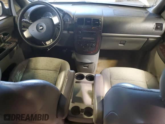 2006 Chevrolet Uplander 3LT with VIN 1GNDV33L56D128723, listed as a Copart auction lot 71594395 with 136,160 mi miles and Salvage title. Bid and sale history available at DreamBid. Image 8.