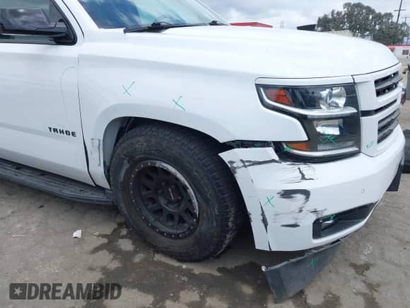 2020 Chevrolet Tahoe LT with VIN 1GNSCBKC0LR290170, listed as a IAAI auction lot 42129712 with 57,414 mi miles and . Bid and sale history available at DreamBid. Image 6.