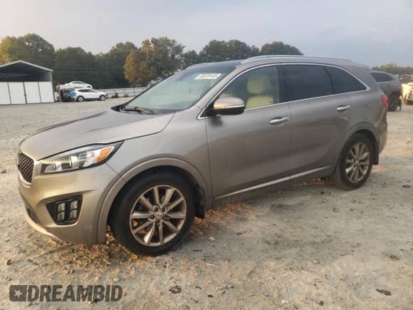 2016 Kia Sorento SX с VIN 5XYPK4A59GG129885, выставлен на аукционе Copart как лот 80078145 с пробегом 172 632 миль миль и Списание • Salvage title. История ставок и продаж доступна на DreamBid. Изображение 1.