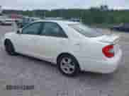 2002 Toyota Camry XLE с VIN 4T1BF30K12U011204, выставлен на аукционе IAAI как лот 43077070 с пробегом 349 350 миль миль и . История ставок и продаж доступна на DreamBid. Изображение 3.