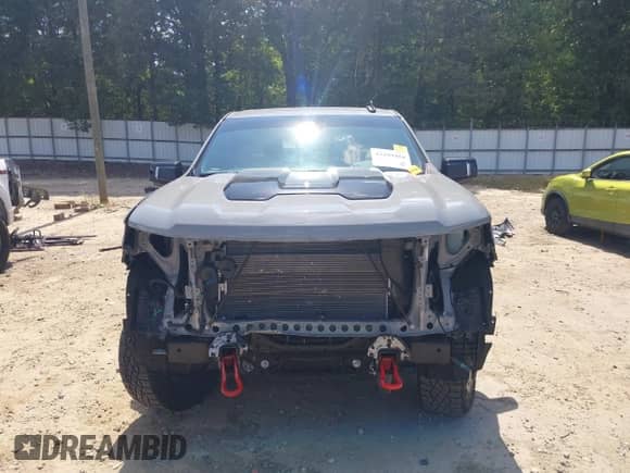 2024 Chevrolet Silverado 1500 LT Trail Boss z VIN 3GCUDFED8RG424927, wystawiony jako IAAI lot #43109404 z przebiegiem 9 117 mil mil oraz . Historia ofert i sprzedaży dostępna na DreamBid. Obrazek 13.