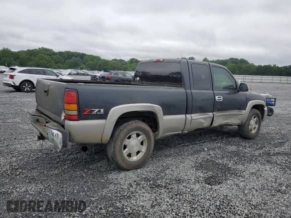 2004 GMC Sierra 1500 SLT z VIN 1GTEK19T14Z146489, wystawiony jako Copart lot #66932135 z przebiegiem 332 391 mil mil oraz Szkoda całkowita • Salvage title. Historia ofert i sprzedaży dostępna na DreamBid. Obrazek 3.