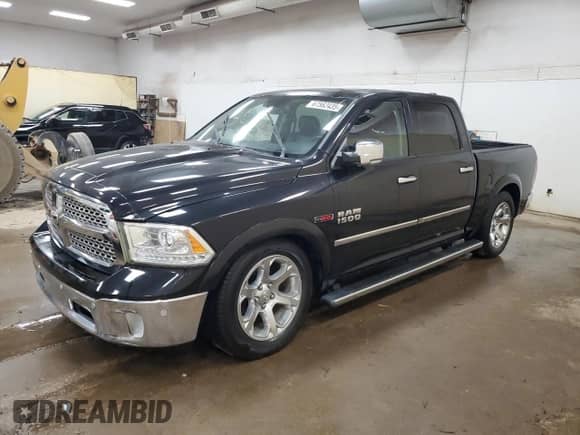 2014 Ram 1500 Laramie z VIN 1C6RR7NM0ES402167, wystawiony jako Copart lot #67562435 z przebiegiem 90 335 mil mil oraz Czysty tytuł • Clean title. Historia ofert i sprzedaży dostępna na DreamBid. Obrazek 1.