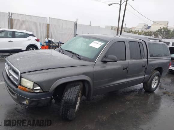 2004 Dodge Dakota Sport z VIN 1D7HL38N94S651302, wystawiony jako IAAI lot #41504334 z przebiegiem Nie podano mil oraz . Historia ofert i sprzedaży dostępna na DreamBid. Obrazek 12.