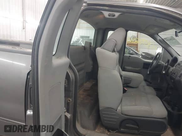 2005 Ford F-150 XL with VIN 1FTRF14W55NB90303, listed as a IAAI auction lot 43398285 with 87,559 mi miles and . Bid and sale history available at DreamBid. Image 8.