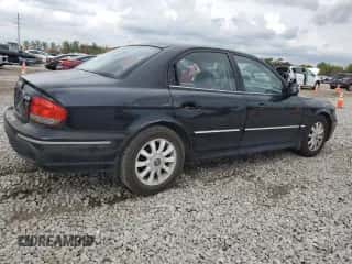 2002 Hyundai Sonata GLS z VIN KMHWF35H52A615774, wystawiony jako Copart lot #72336474 z przebiegiem 156 588 mil mil oraz Szkoda całkowita • Salvage title. Historia ofert i sprzedaży dostępna na DreamBid. Obrazek 3.