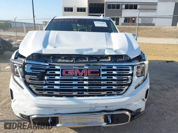 2023 GMC Sierra 1500 Denali z VIN 3GTUUGED4PG345211, wystawiony jako IAAI lot #42995625 z przebiegiem 63 396 mil mil oraz . Historia ofert i sprzedaży dostępna na DreamBid. Obrazek 12.