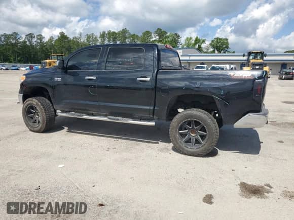 2014 Toyota Tundra Limited z VIN 5TFFY5F10EX160846, wystawiony jako Copart lot #56396525 z przebiegiem 208 720 mil mil oraz Szkoda całkowita • Salvage title. Historia ofert i sprzedaży dostępna na DreamBid. Obrazek 2.