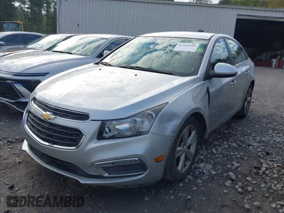 2015 Chevrolet Cruze LT with VIN 1G1PE5SB9F7200332, listed as a IAAI auction lot 43403040 with 154,776 mi miles and . Bid and sale history available at DreamBid. Image 2.