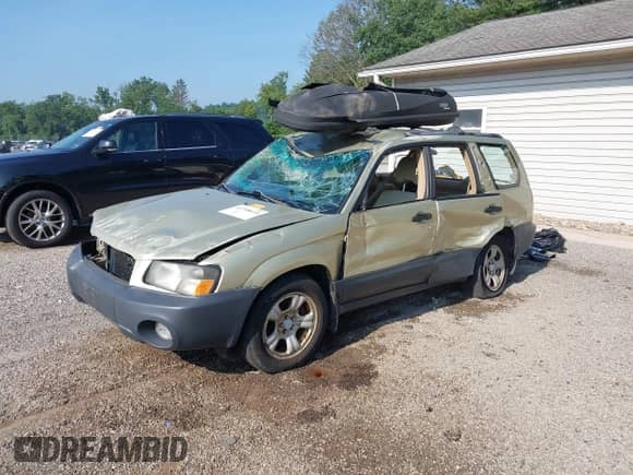 2003 Subaru Forester X with VIN JF1SG63643G749666, listed as a IAAI auction lot 42708610 with 181,727 mi miles and . Bid and sale history available at DreamBid. Image 2.