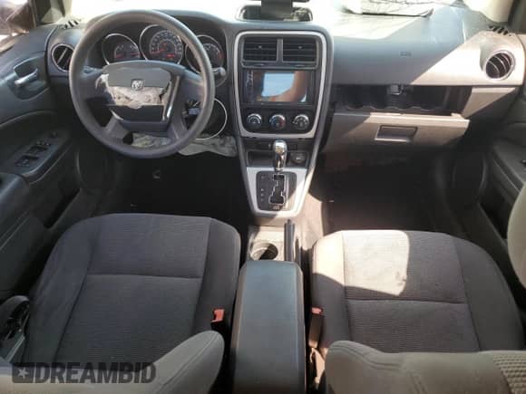 2011 Dodge Caliber Heat with VIN 1B3CB5HA7BD168362, listed as a Copart auction lot 62889895 with 129,138 mi miles and Salvage title. Bid and sale history available at DreamBid. Image 8.