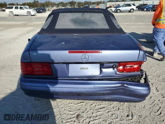 1997 Mercedes-Benz SL 500 с VIN WDBFA63F1VF152883, выставлен на аукционе Copart как лот 77570524 с пробегом Не указан миль и Списание • Salvage title. История ставок и продаж доступна на DreamBid. Изображение 6.