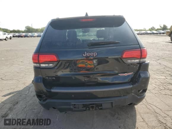 2018 Jeep Grand Cherokee Trailhawk z VIN 1C4RJFLT4JC250144, wystawiony jako Copart lot #72010025 z przebiegiem 92 357 mil mil oraz Czysty tytuł • Clean title. Historia ofert i sprzedaży dostępna na DreamBid. Obrazek 6.