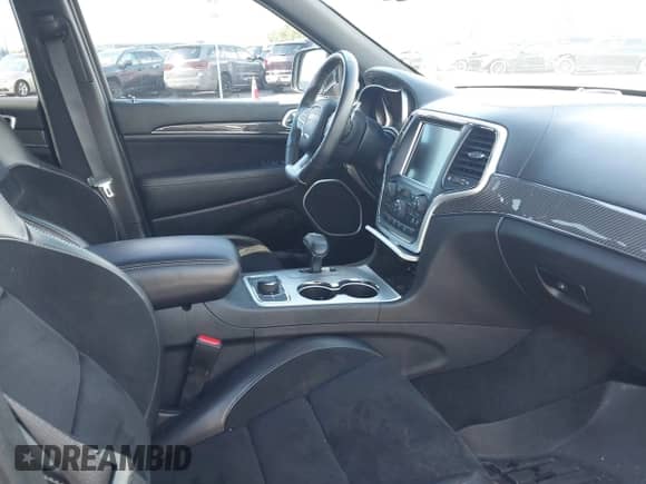 2014 Jeep Grand Cherokee SRT-8 with VIN 1C4RJFDJ0EC340653, listed as a IAAI auction lot 43119780 with 45,693 mi miles and . Bid and sale history available at DreamBid. Image 5.