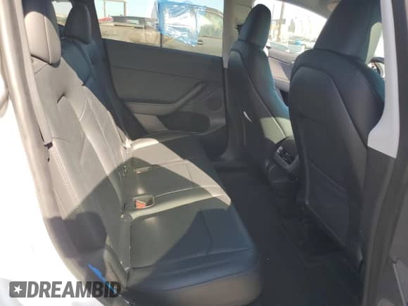 2023 Tesla Model Y Long Range with VIN 7SAYGDEE8PA093209, listed as a Copart auction lot 80299485 with 90,434 mi miles and Salvage title. Bid and sale history available at DreamBid. Image 10.
