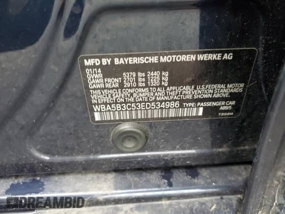 2014 BMW 5 Series 535i xDrive with VIN WBA5B3C53ED534986, listed as a Copart auction lot 51571485 with 115,166 mi miles and Salvage title. Bid and sale history available at DreamBid. Image 14.