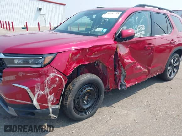 2023 Honda Pilot Elite with VIN 5FNYG1H83PB004800, listed as a IAAI auction lot 42883135 with 12,162 mi miles and . Bid and sale history available at DreamBid. Image 6.